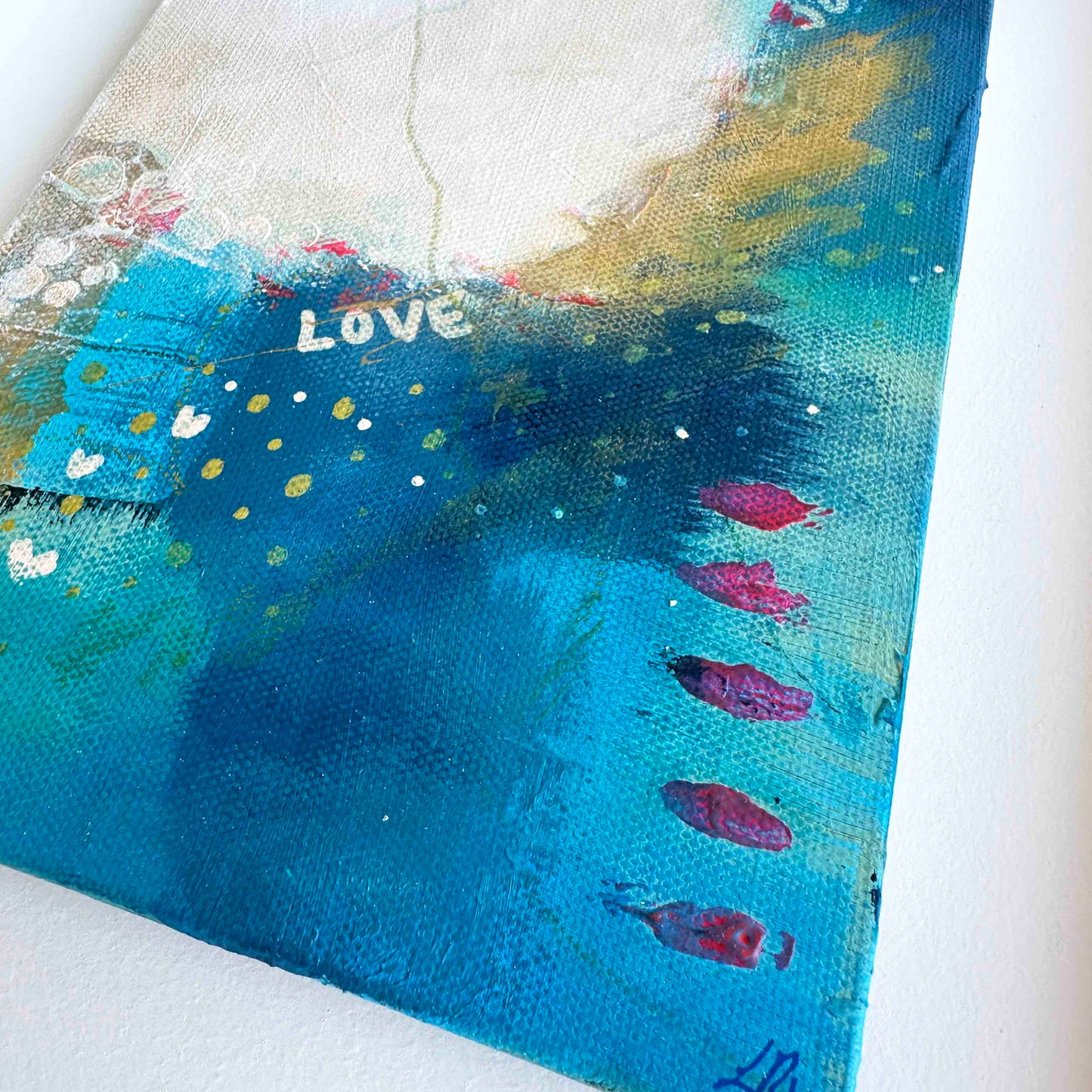 Small abstract original painting inspired by the colours of the ocean in Cornwall. The words Love and Joy can be found within the painting