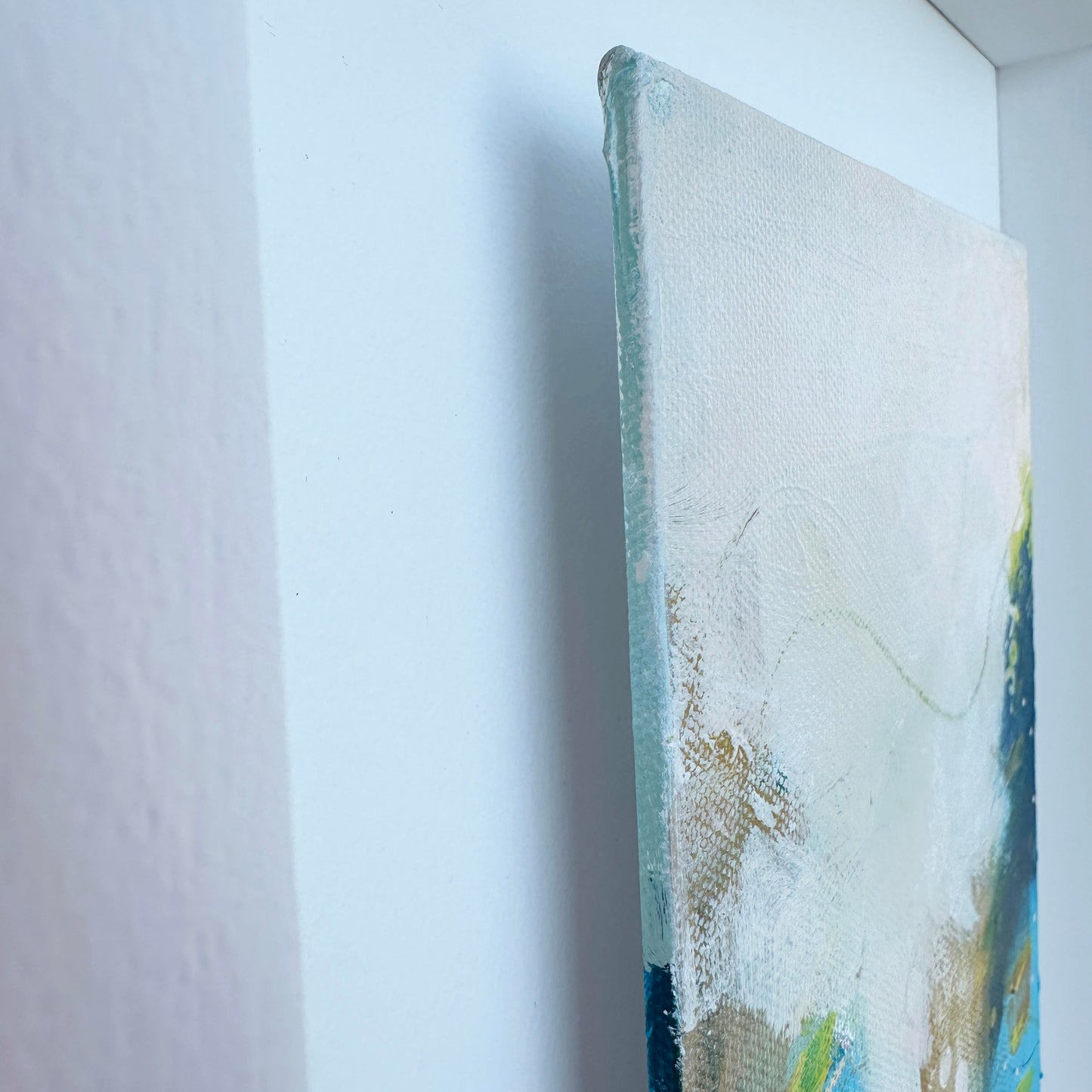 Small abstract original painting inspired by the colours of the ocean in Cornwall. The words Love and Joy can be found within the painting