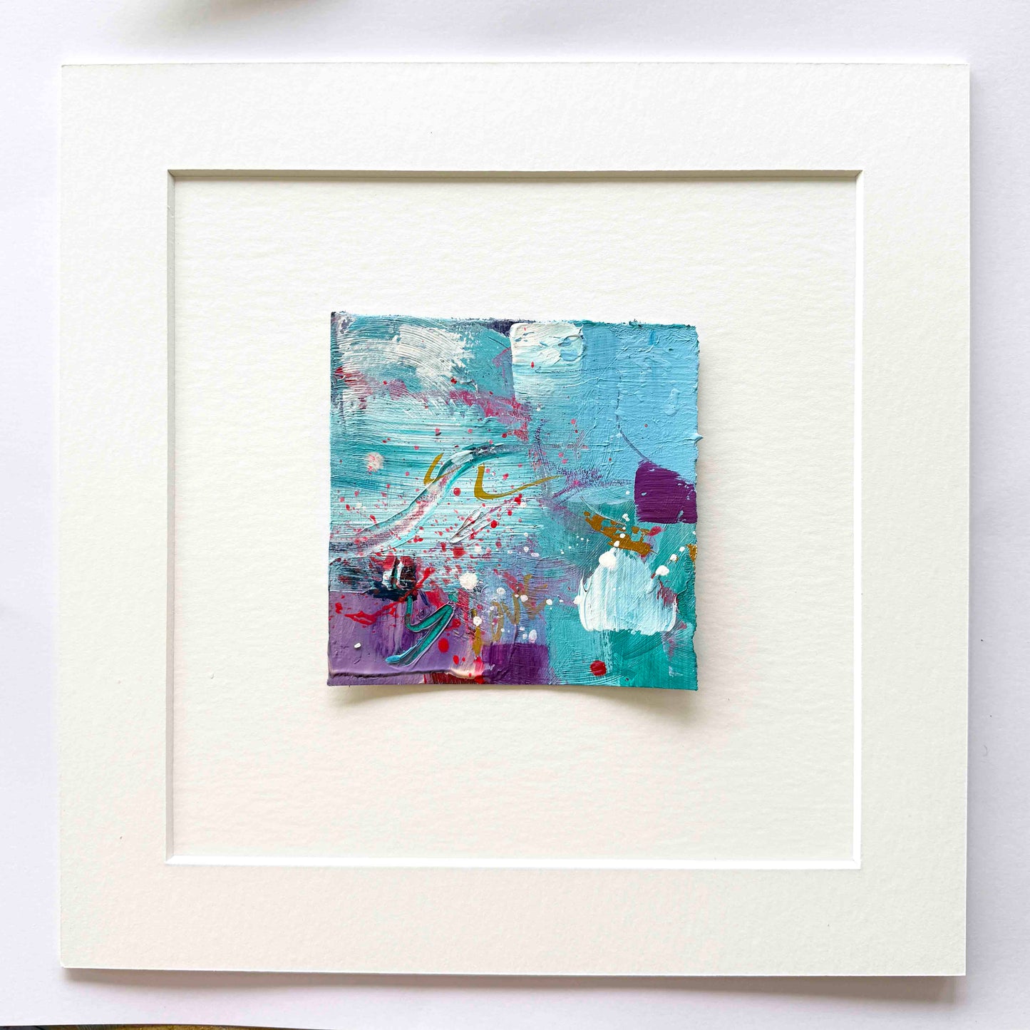 Abstract mini painting in pink, purple, copper and aqua blue with the word love