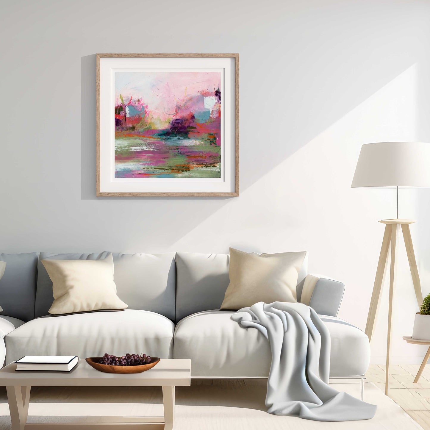 Modern living room with a colorful abstract painting on the wall.