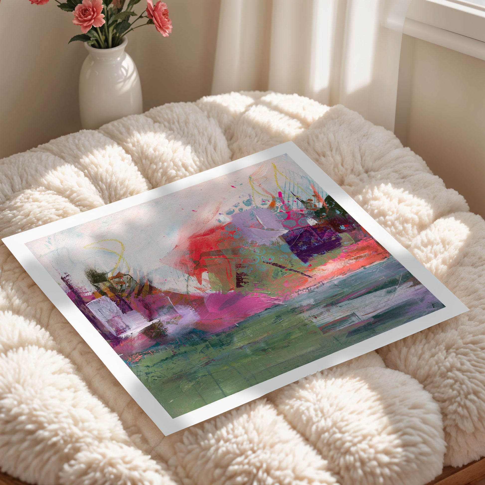 Where The Tide Lifts Abstract art print on a textured surface with a vase of flowers in the background.